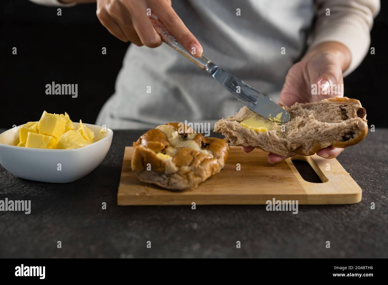 Applying butter hi-res stock photography and images - Alamy