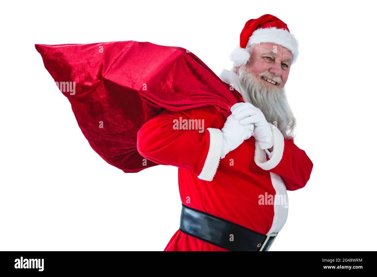 Santa Claus holding christmas bag Stock Photo - Alamy