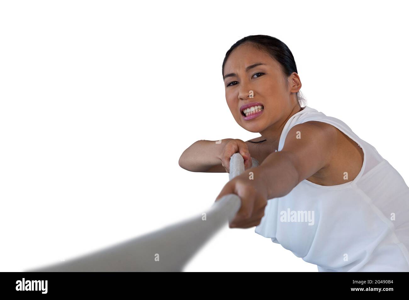 Close up portrait of woman clenching teeth while pulling rope Stock