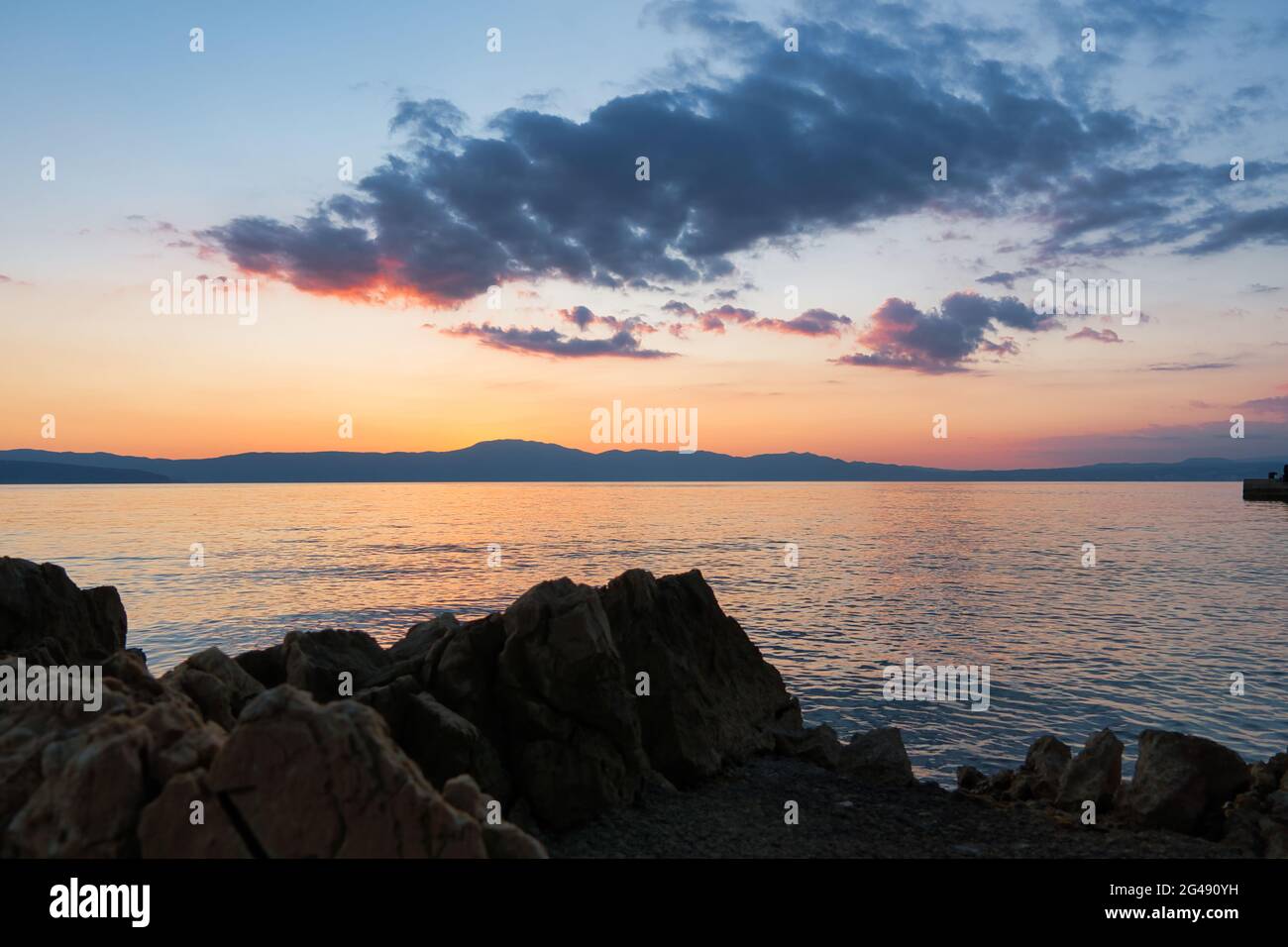Beautiful shot of the sunset sky over the sea Stock Photo - Alamy