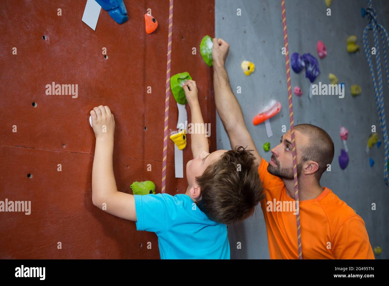 Climbing wall indoor helmet hi-res stock photography and images - Alamy