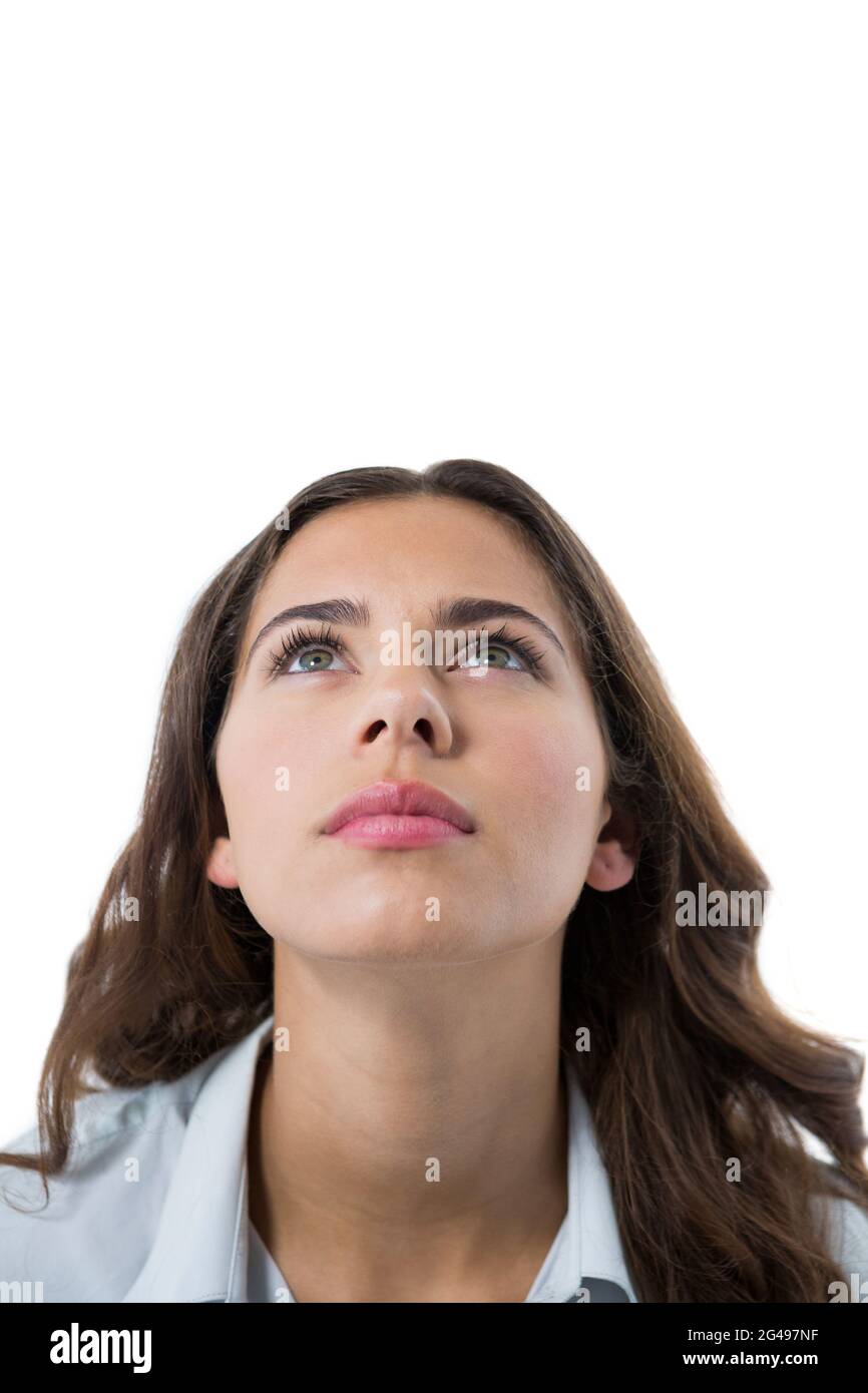 Female executive against white background Stock Photo - Alamy