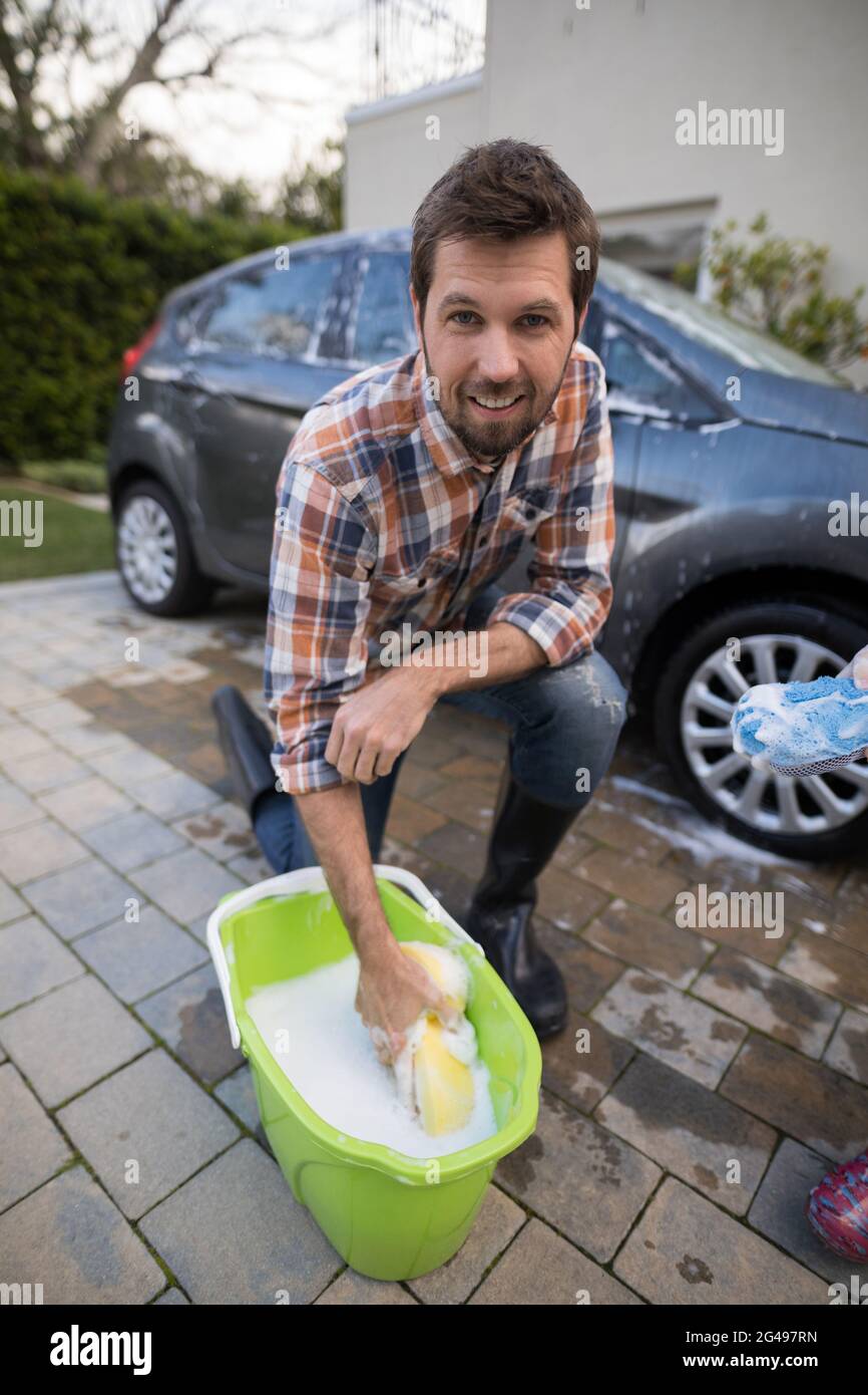 Man washing a car Stock Photo Alamy
