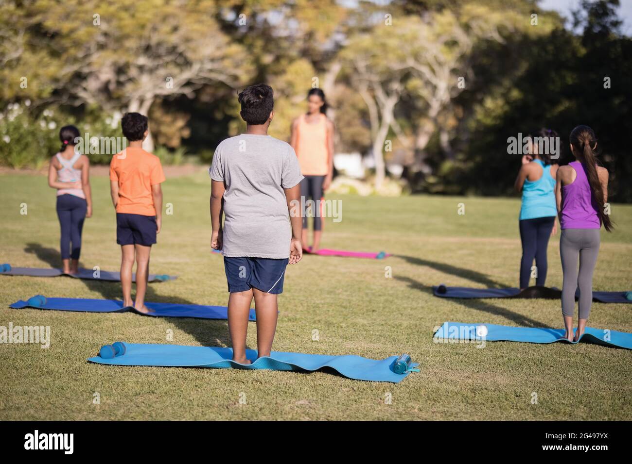 Group teacher standing on exercise hi-res stock photography and images ...