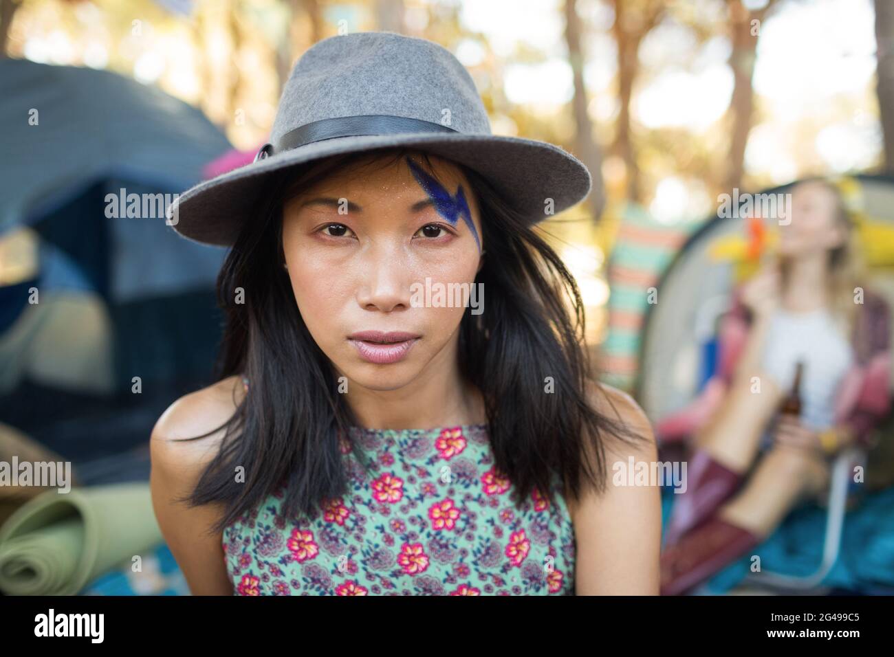 Asian woman wearing hat serious hi-res stock photography and images - Alamy