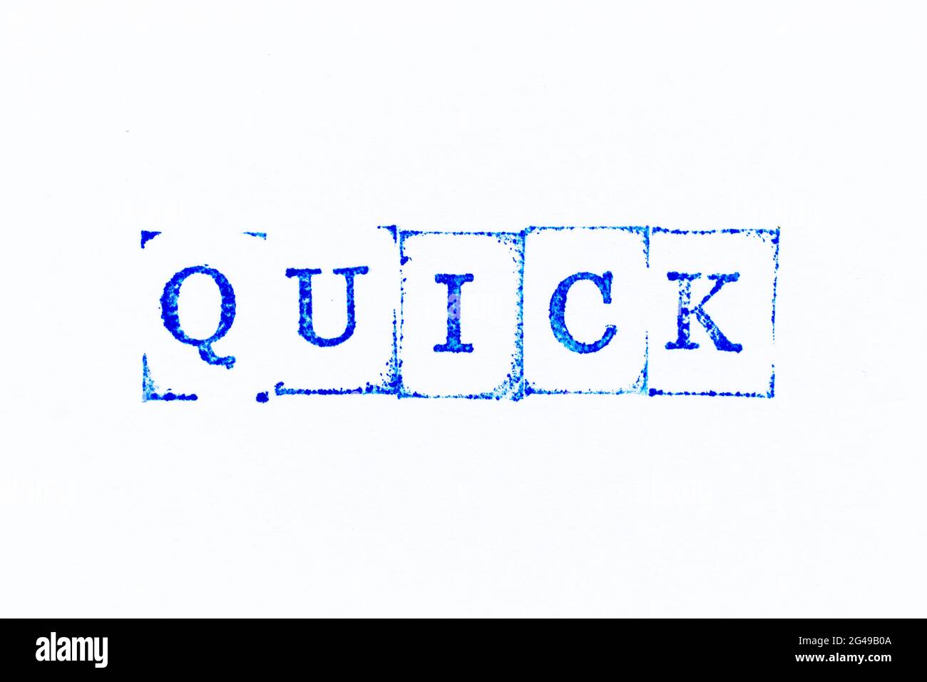 Blue color ink rubber stamp in word quick on white paper background Stock Photo