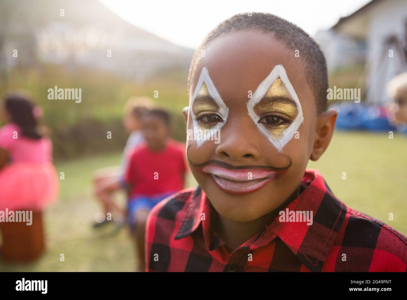 Close up portrait of boy with face paint Stock Photo