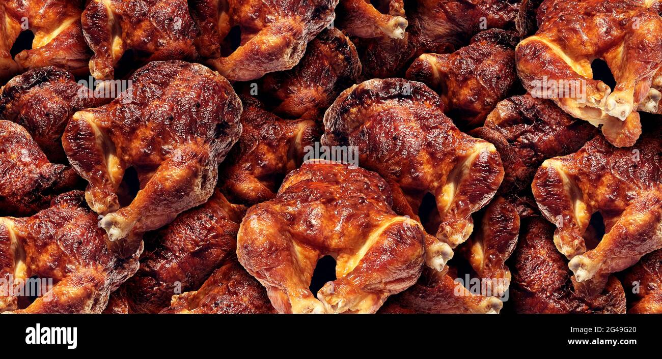 BBQ chicken background with a group of rotisserie chickens as a symbol for barbecue poultry. Stock Photo