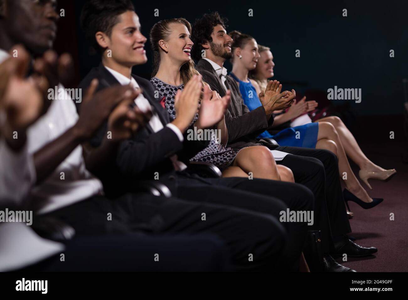 People clapping stand hi-res stock photography and images - Alamy