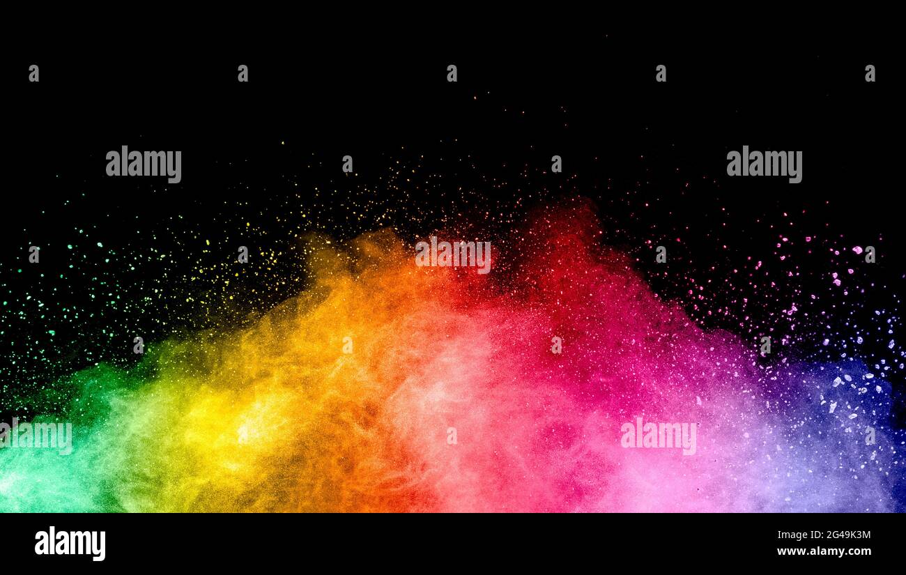 Abstract multicolored powder explosion on black background. Stock Photo