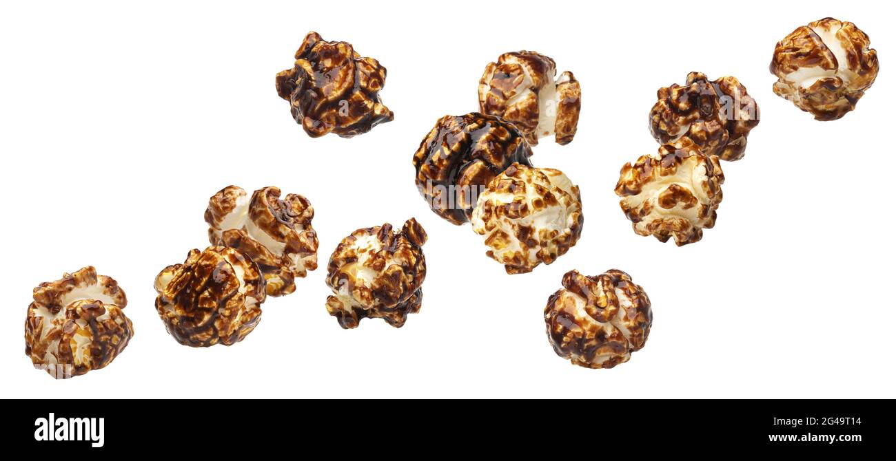 Falling chocolate popcorn isolated on white background Stock Photo