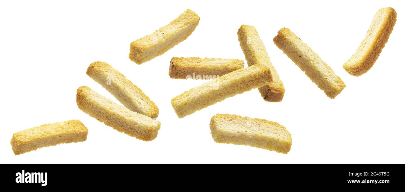Falling bread croutons isolated on white background Stock Photo