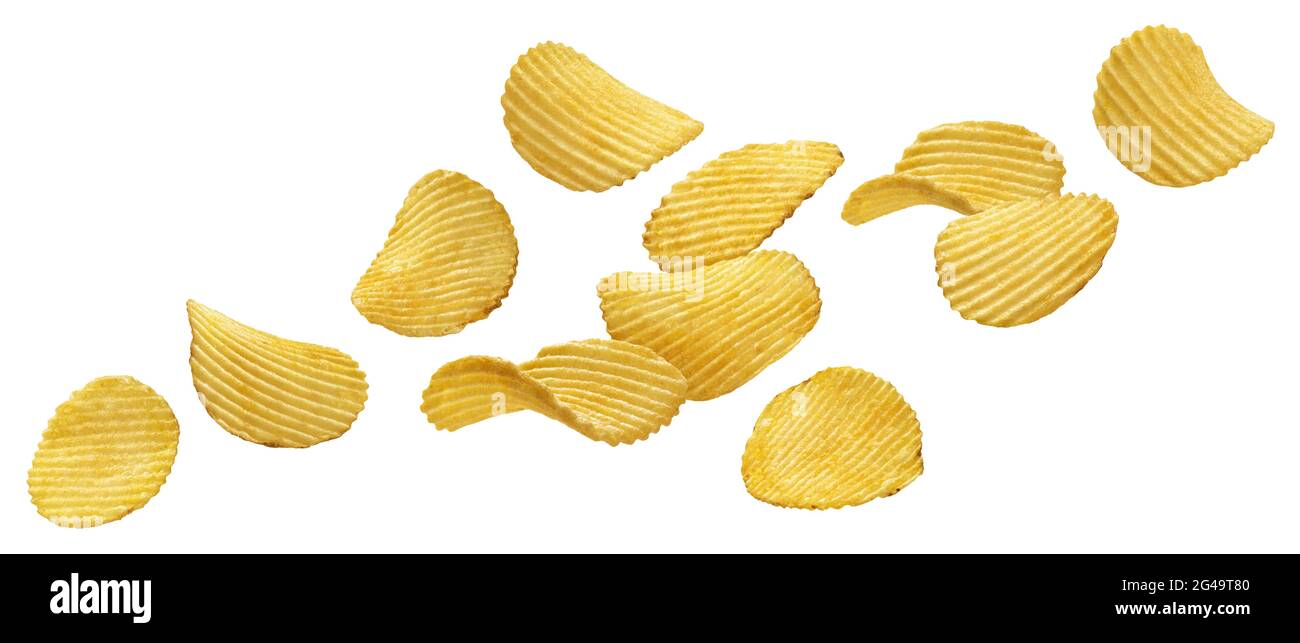 Falling ridged potato chips isolated on white background Stock Photo