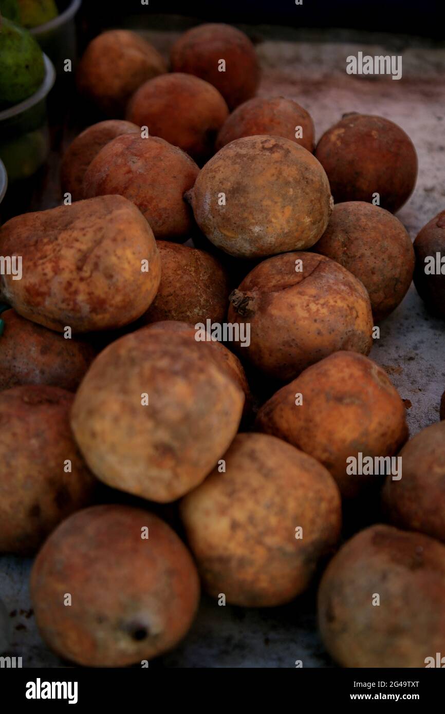 salvador, bahia, brazil - june 18, 2021: genipapo fruit is seen for sale at a free fair in the city of Salvador. *** Local Caption *** Stock Photo