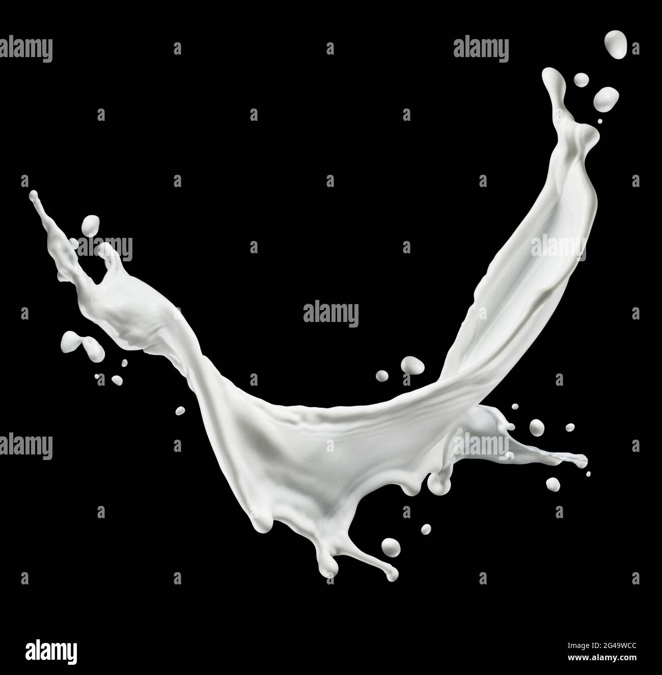 Milk splash isolated on black background Stock Photo