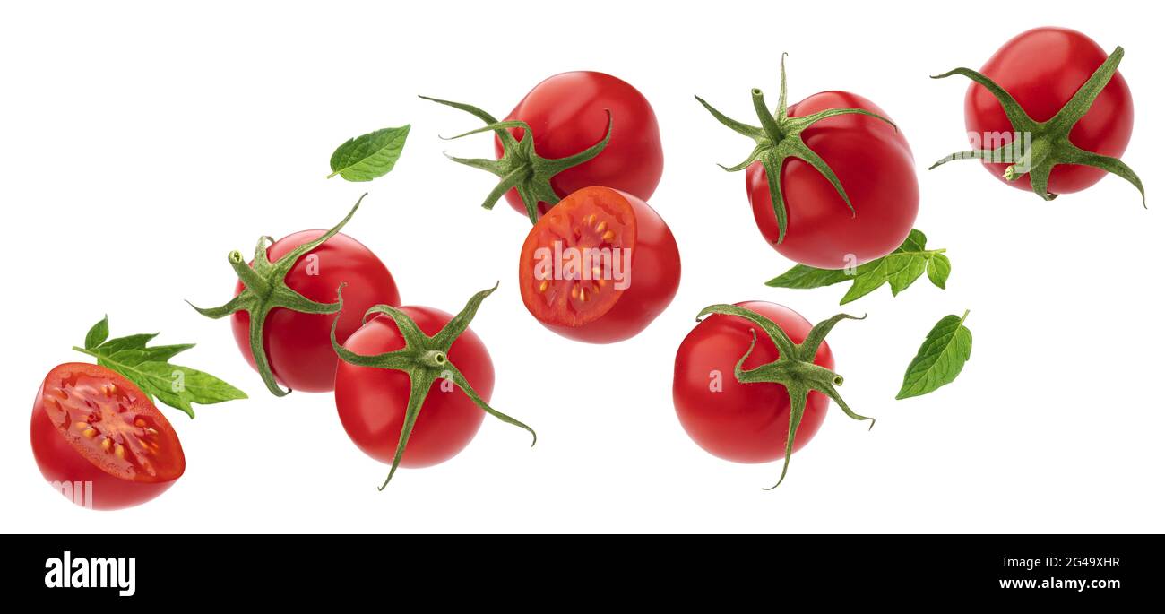 Falling Cherry Tomato isolated on white background Stock Photo