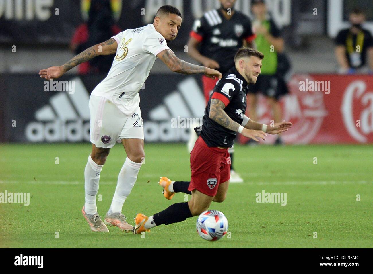 Washington, USA. 19th June, 2021. Inter Miami FC midfielder Gregore Silva (26) fouls D.C. United midfielder Paul Arriola (7) in the second half at Audi Field in Washington, DC, Saturday, June 20, 2021. United defeated Inter Miami 1-0. (Photo by Chuck Myers/Sipa USA) Credit: Sipa USA/Alamy Live News Stock Photo