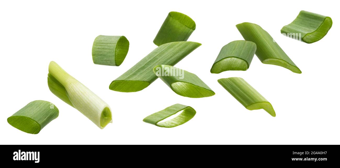 Falling green onion slices, cut chives isolated on white background Stock Photo Alamy