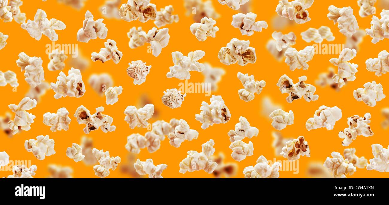 Popcorn seamless pattern. Popcorn on yellow color background Stock Photo