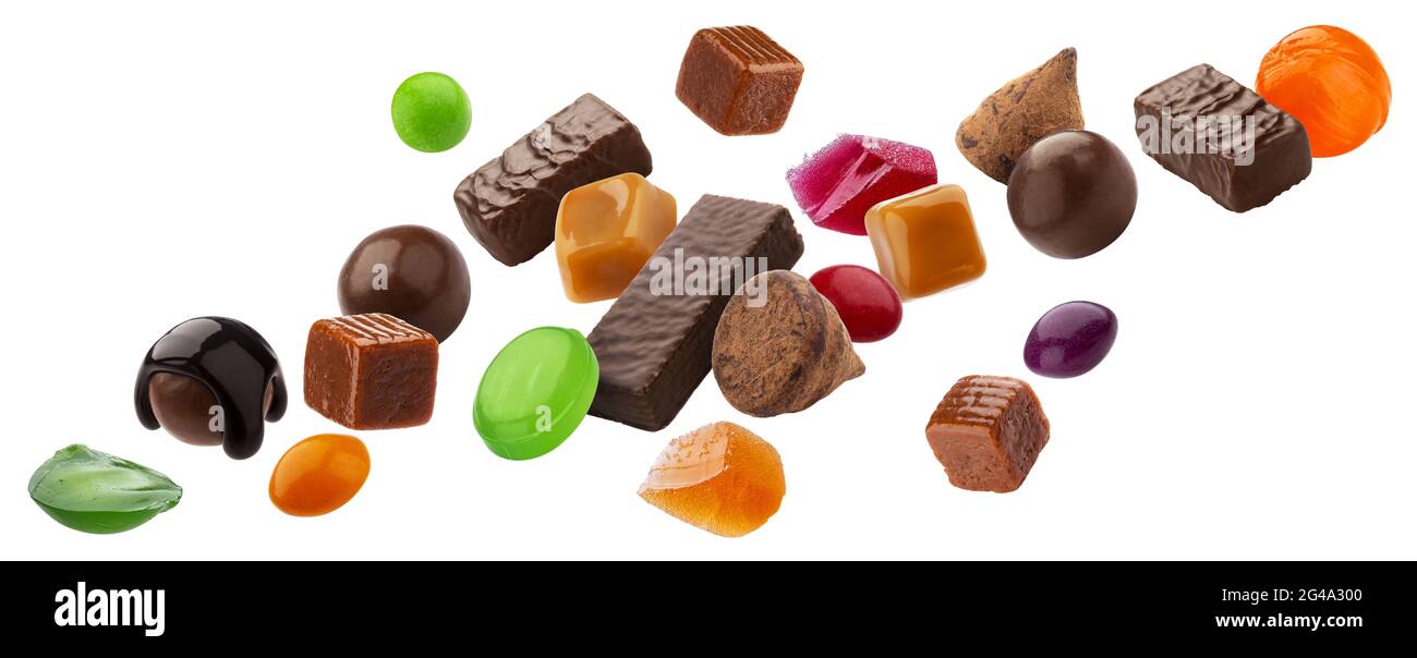 Various jelly candies, caramels, lollipops isolated on white background with clipping path Stock Photo