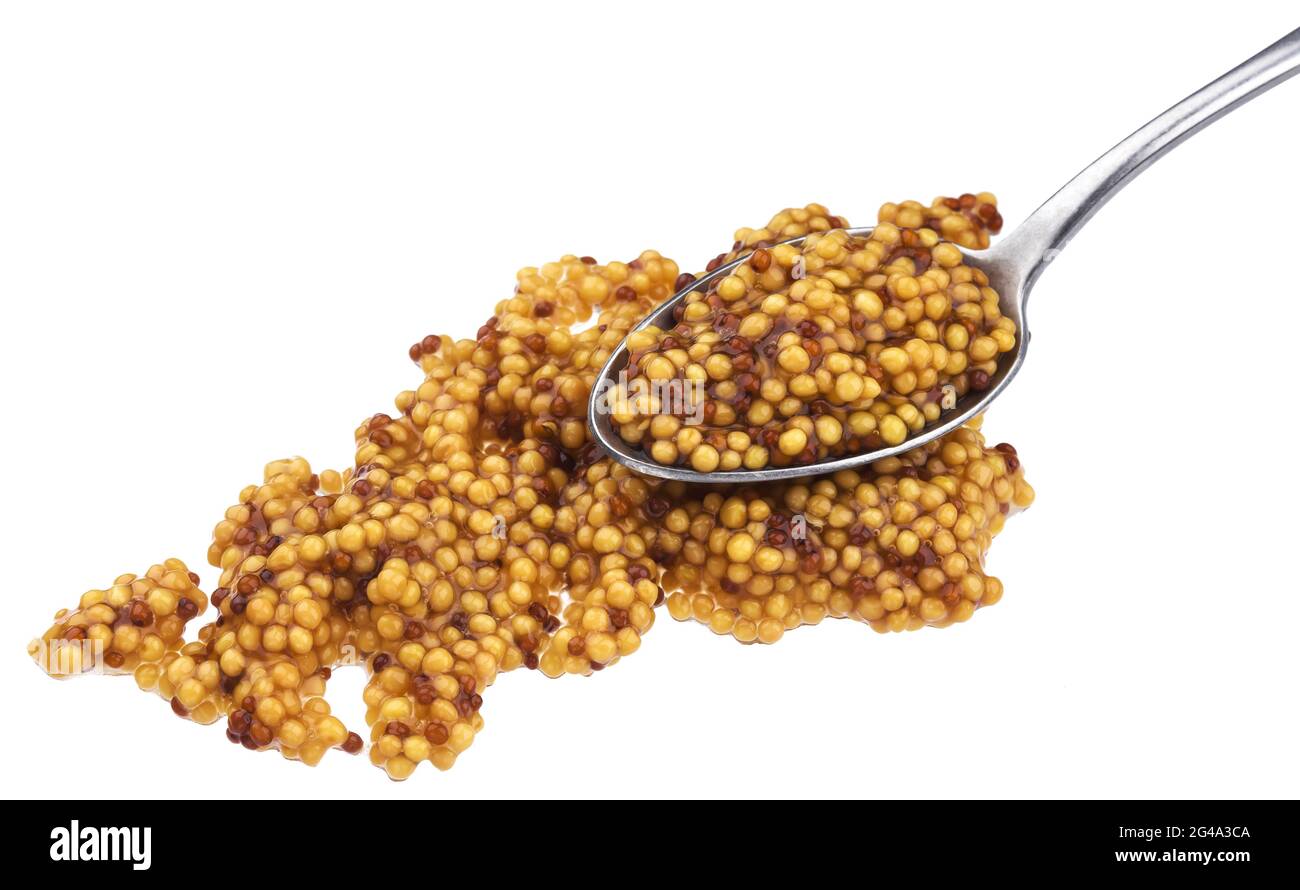 French mustard with spoon isolated on white background Stock Photo