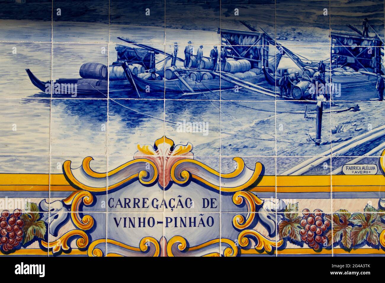 Train station ornamented with tiles representing images of the vendimia (wine harvest) in Pinhao village at a bend of the Douro river north of the cit Stock Photo