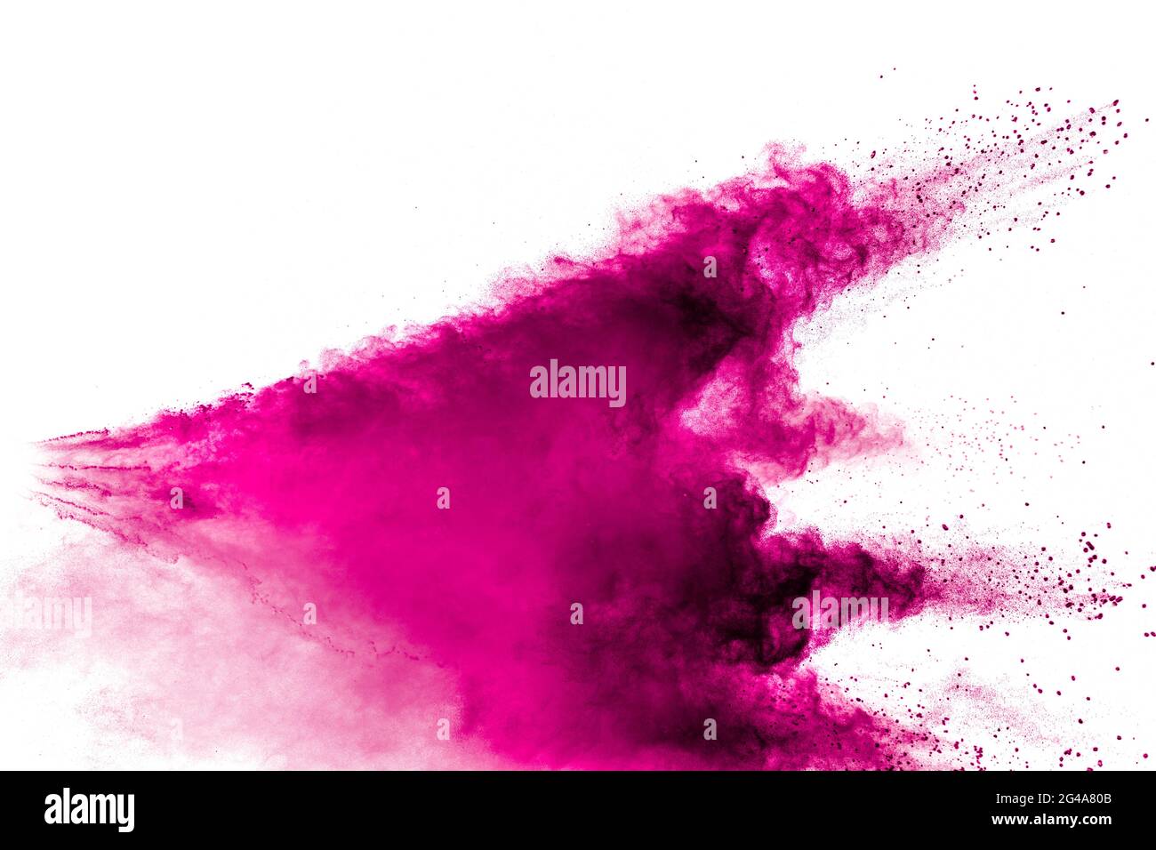 Abstract pink powder explosion on white background. Freeze motion of pink powder splash. Stock Photo