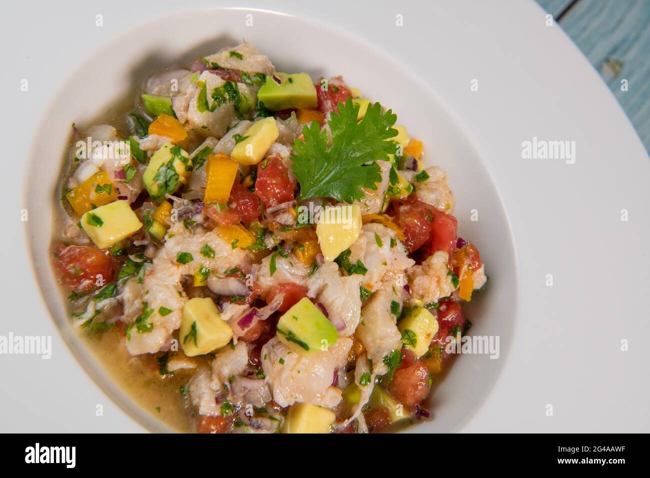 Cod Ceviche recipe, bread in oil and garlic Stock Photo Alamy