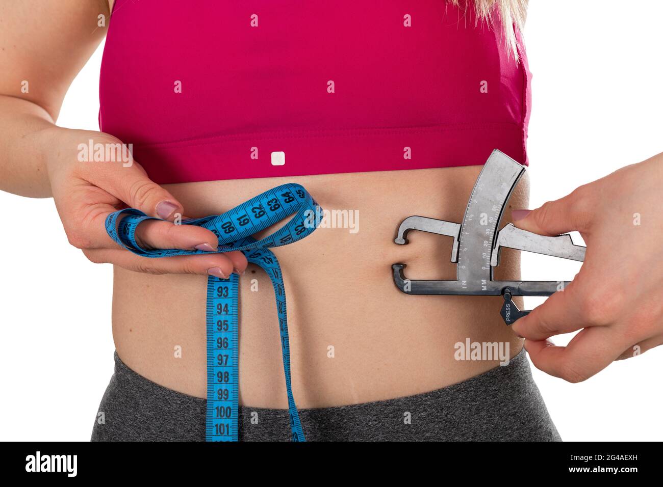 Man is Measuring His Body Fat with Calipers. Stock Photo - Image of  exercise, holding: 69566936