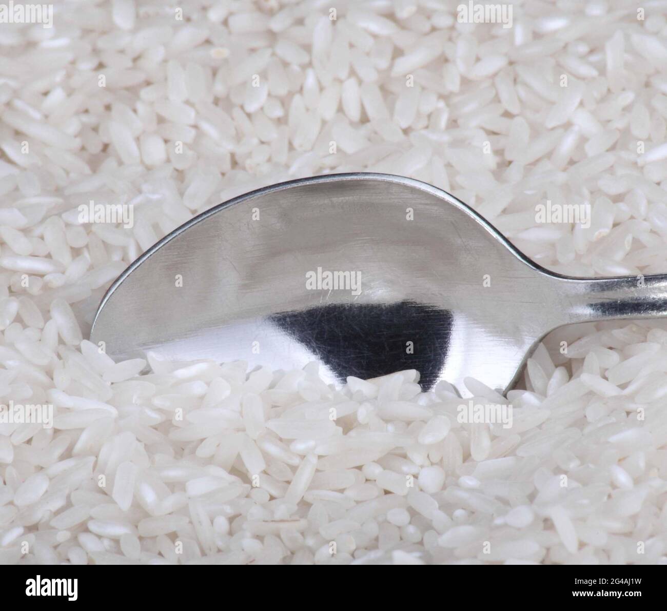 rice food background and teaspoon Stock Photo - Alamy