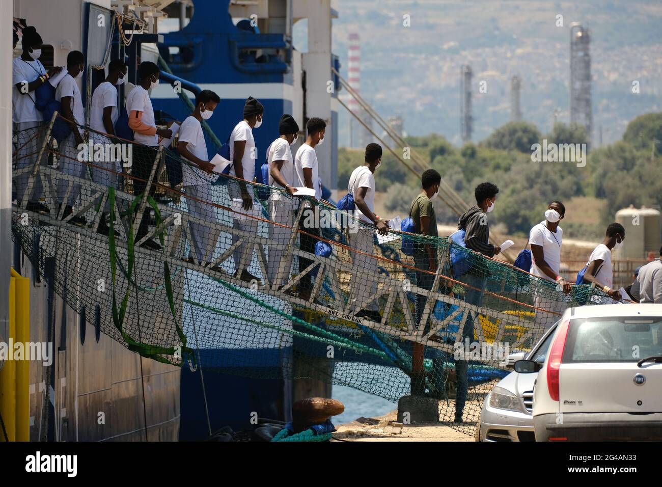AUGUSTA, SICILY, ITALY – JUNE 18: 415 migrants rescued by Geo Barents vessel of Doctors Without Borders arrived in Augusta for disembarkation on 2021 in Sicily. 'In less than 48 hours, seven rescues and 410 persons saved from drowning,' tweeted the humanitarian organization Doctors without Borders (MSF) on Saturday, June 12. Among those rescued are women and children.The Geo Barents is the largest search-and-rescue ship of the six the NGO has worked with until now. It has capacity for 300 people and is carrying a ton of medicines, 1,200 blankets and 12.5 tons of food. Stock Photo