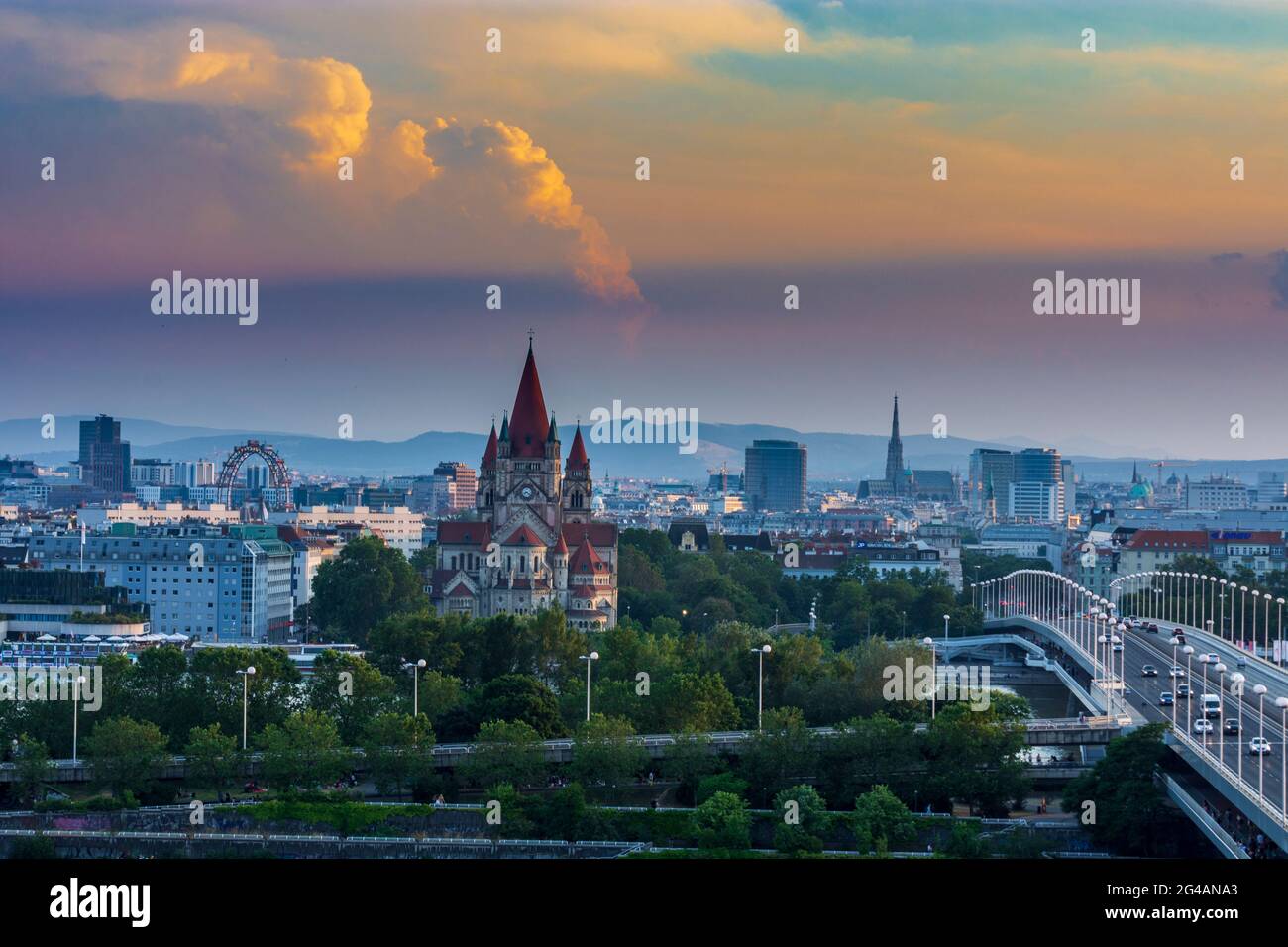 Wien, Vienna: Vienna city center, river Donau (Danube), bridge Reichsbrücke, church Franz von Assisi, cathedral Stephansdom (St. Stephen's Cathedral), Stock Photo