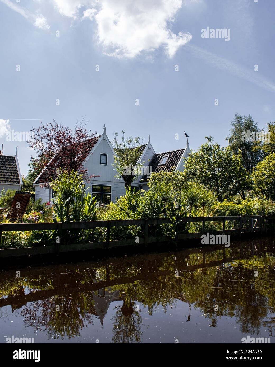 Boat tour through Broek in Waterland, a typical Dutch village in the Netherlands Stock Photo