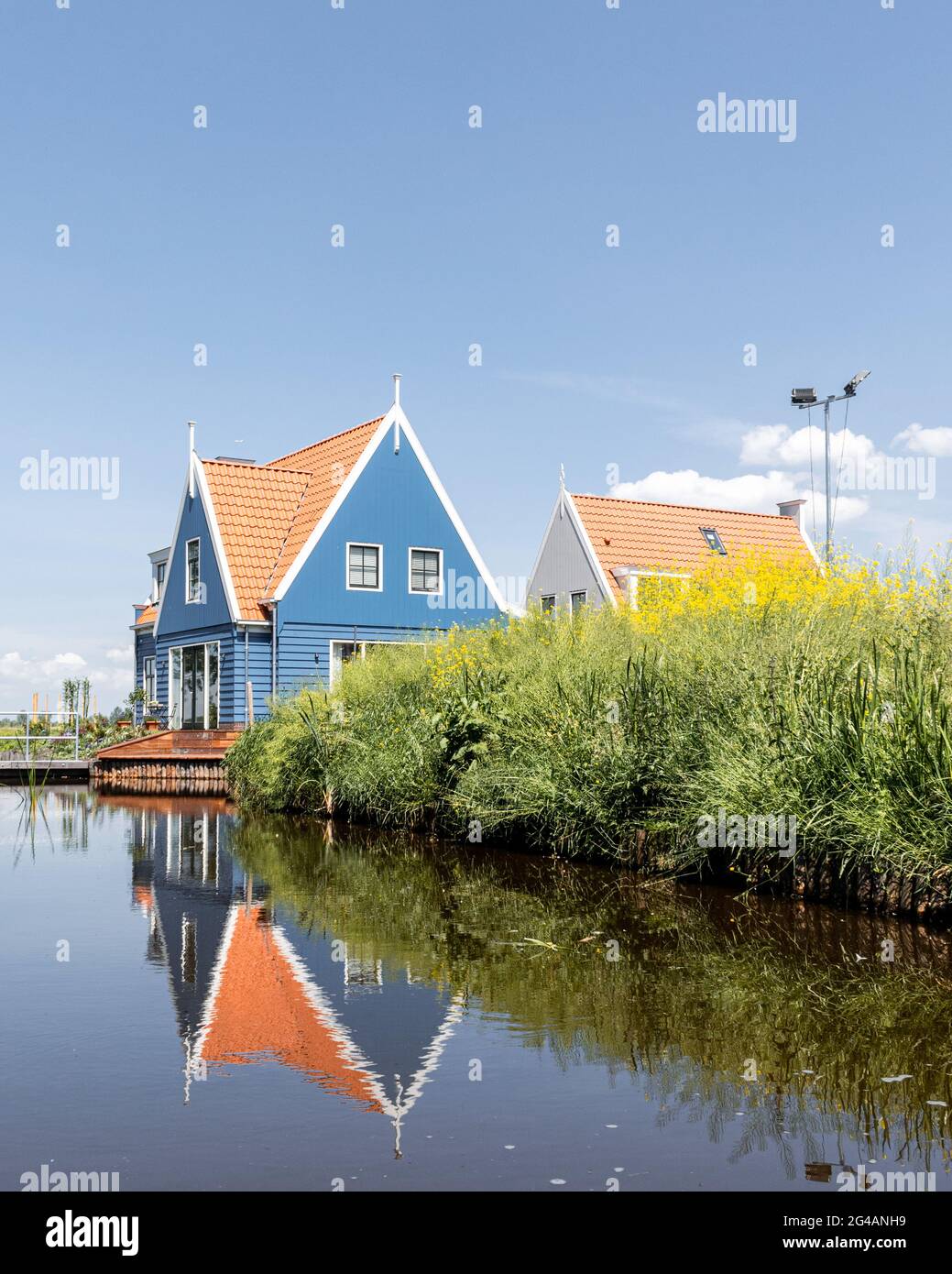 Boat tour through Broek in Waterland, a typical Dutch village in the Netherlands Stock Photo