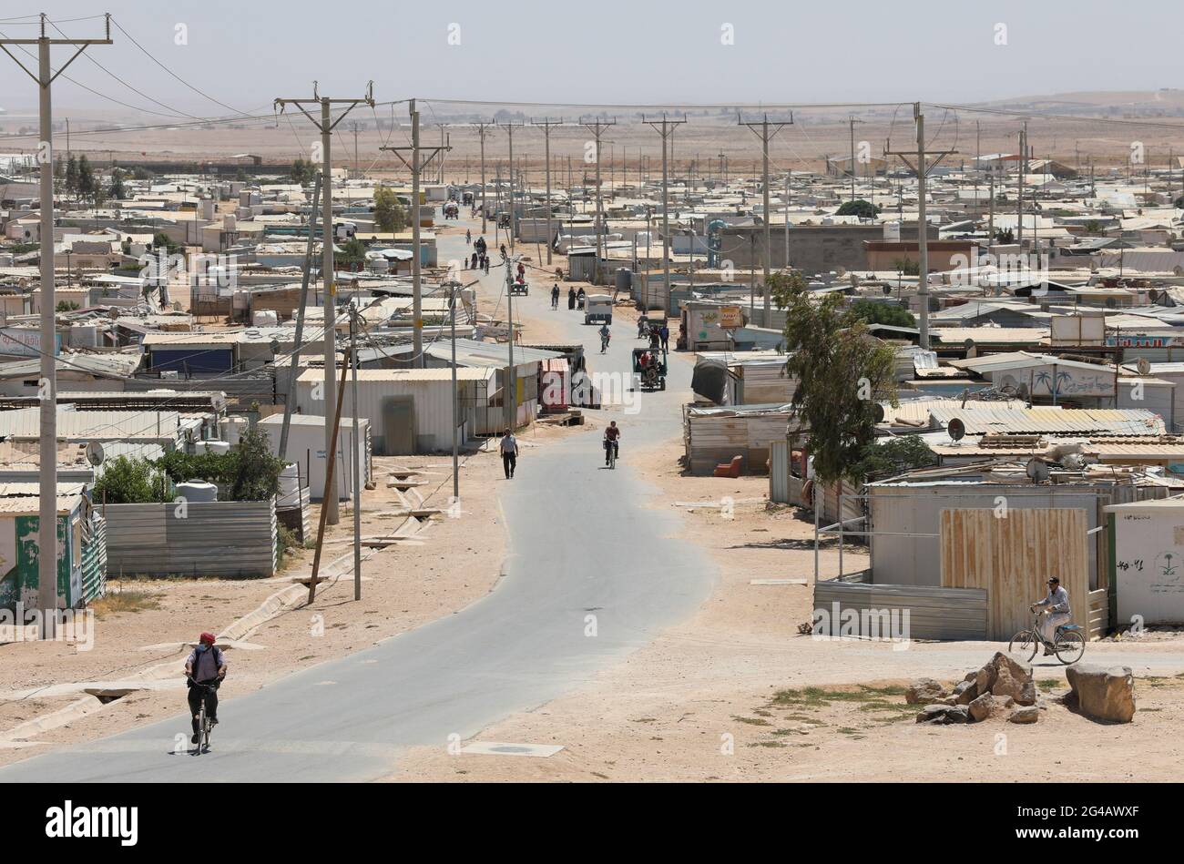 Syrian refugees are seen at the Zaatari refugee camp in the Jordanian city  of Mafraq, near the border with Syria, Jordan June 17, 2021. Picture taken  June 17, 2021. REUTERS/Alaa Al Sukhni