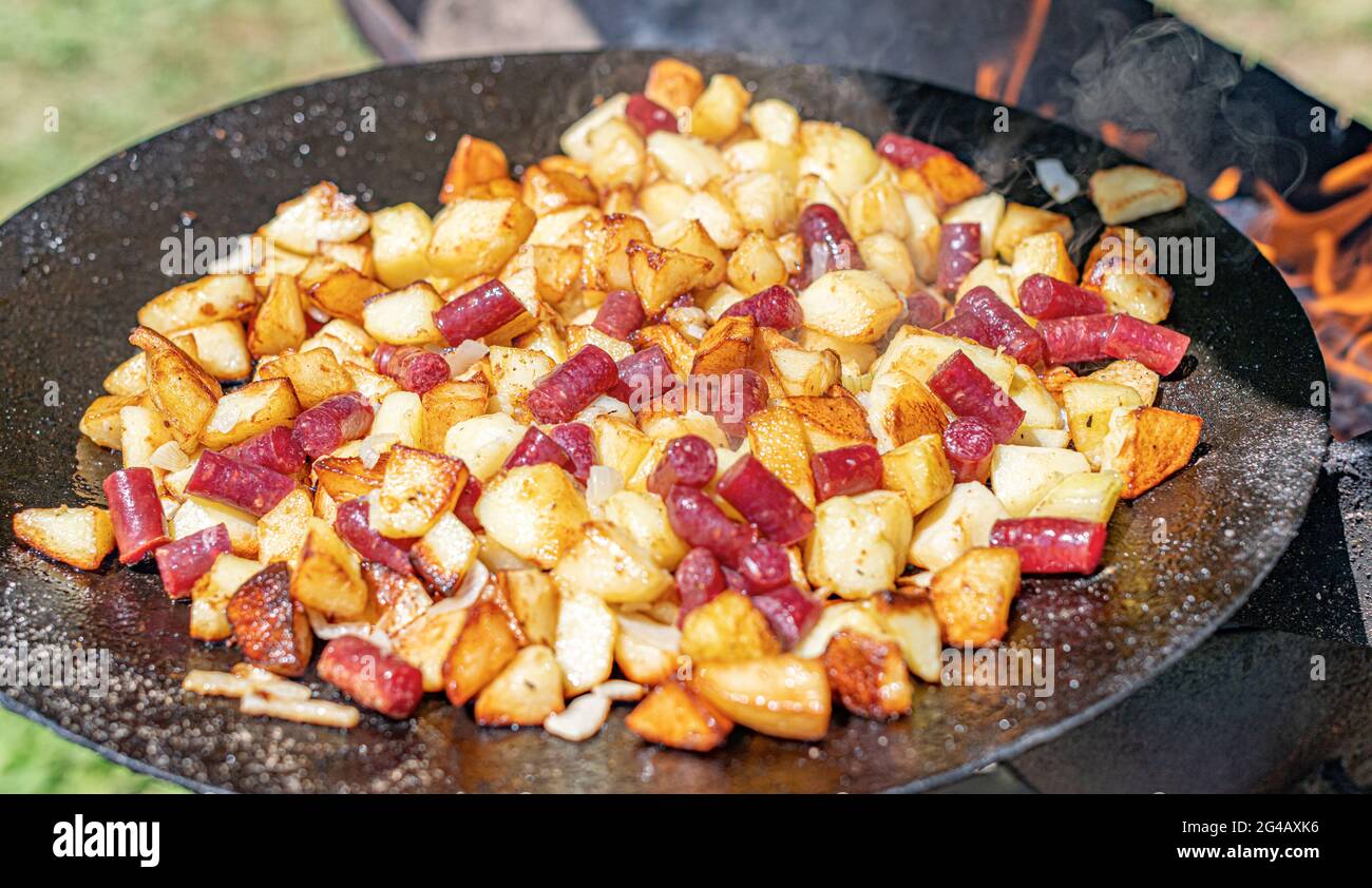 Fried potatoes on a fire or grill Stock Photo Alamy