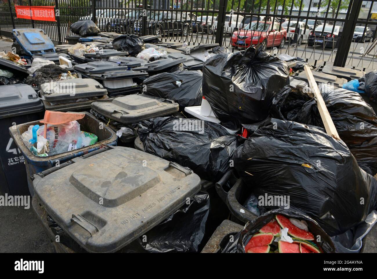 A gathering of full wheely bins in Beijing, China Stock Photo