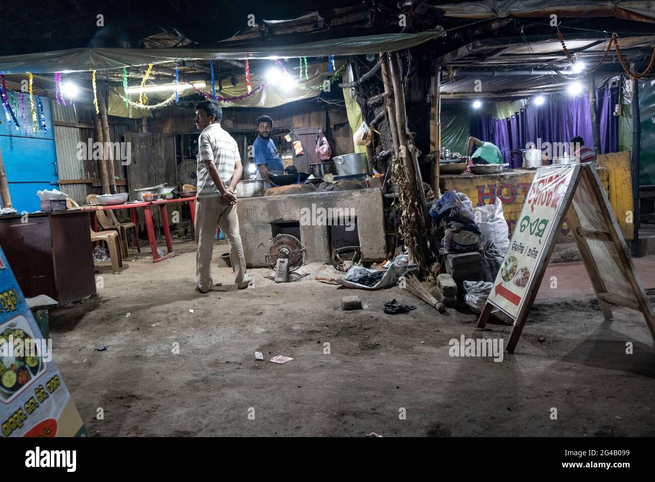 Men readying restaurant for the evening shift Stock Photo - Alamy
