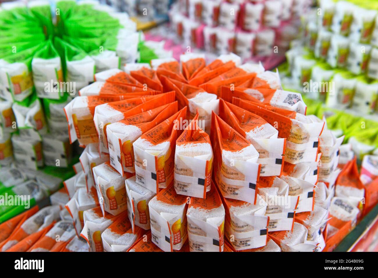 Many enticing sweets on display in a shop at Beijing Railway Station, China Stock Photo