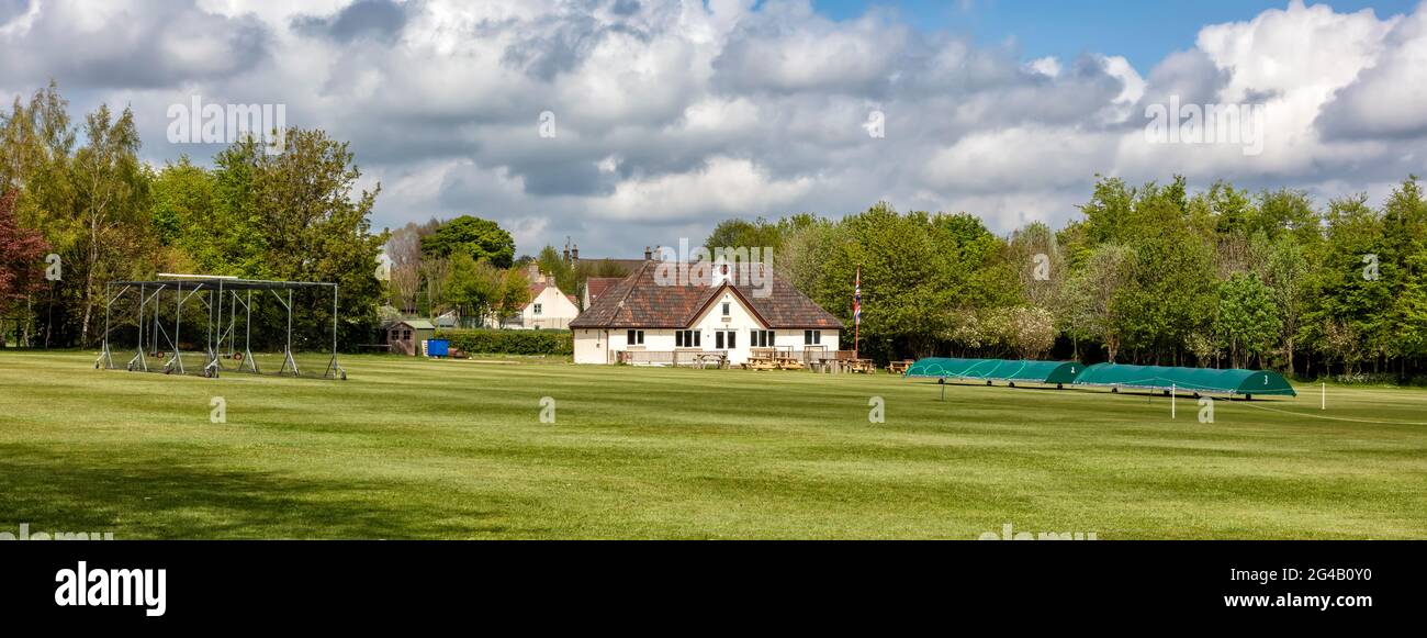 Typical village cricket ground in The Cotswolds, Gloucestershire, England, United Kingdom Stock Photo