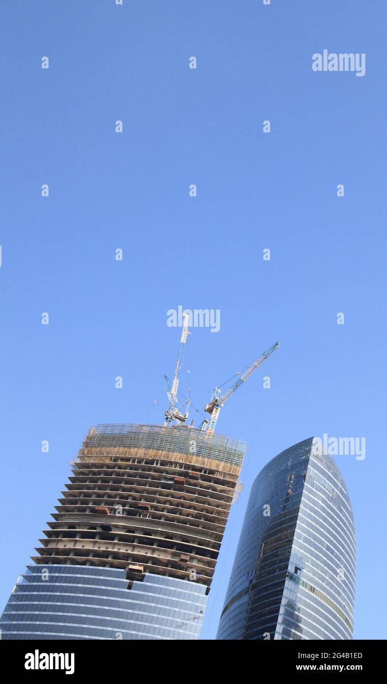 skyscraper develop on sky background at day Stock Photo - Alamy