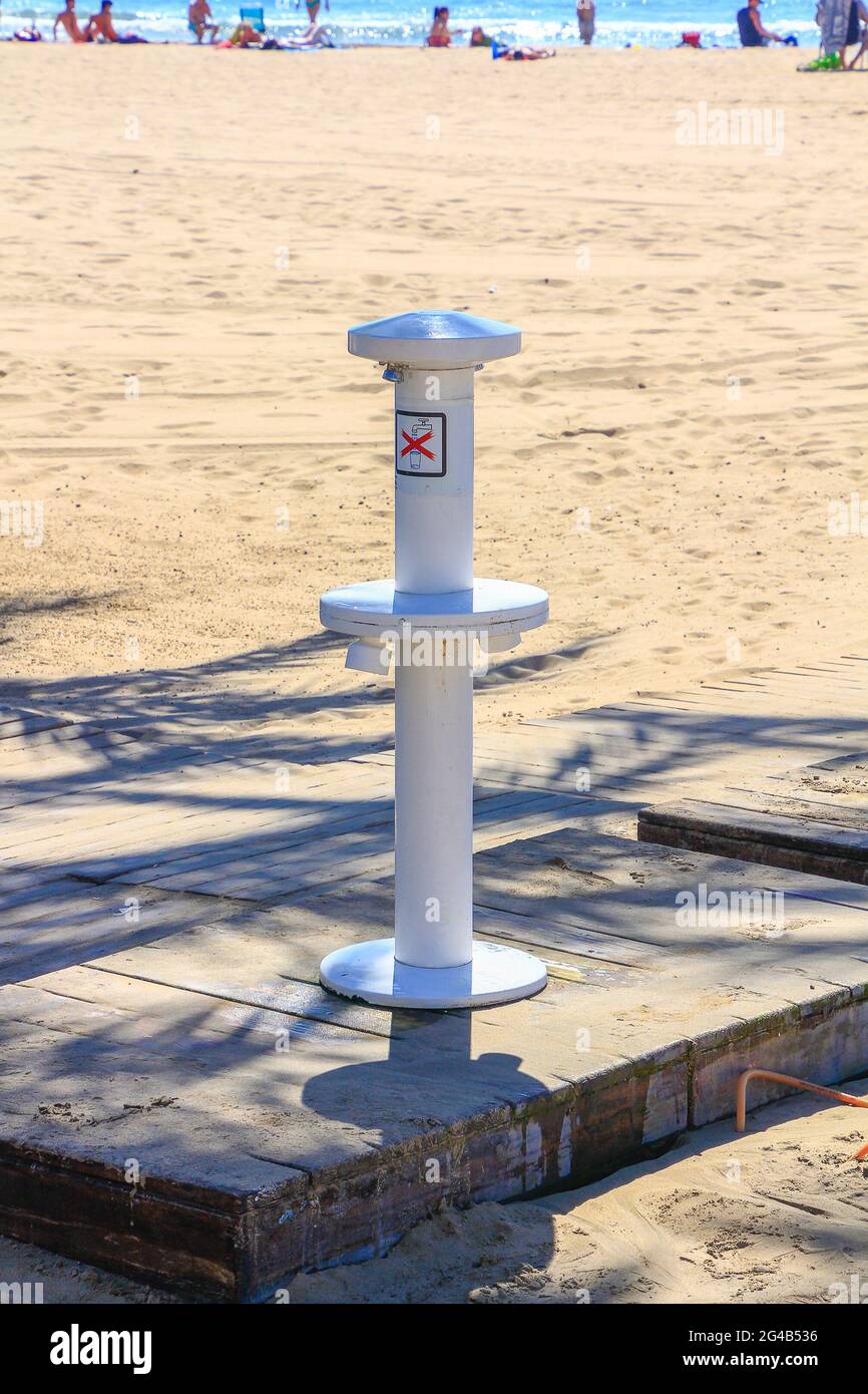 Alicante, Spain; 08/05/2019: fountain to clean the earth from the feet on the beach Stock Photo