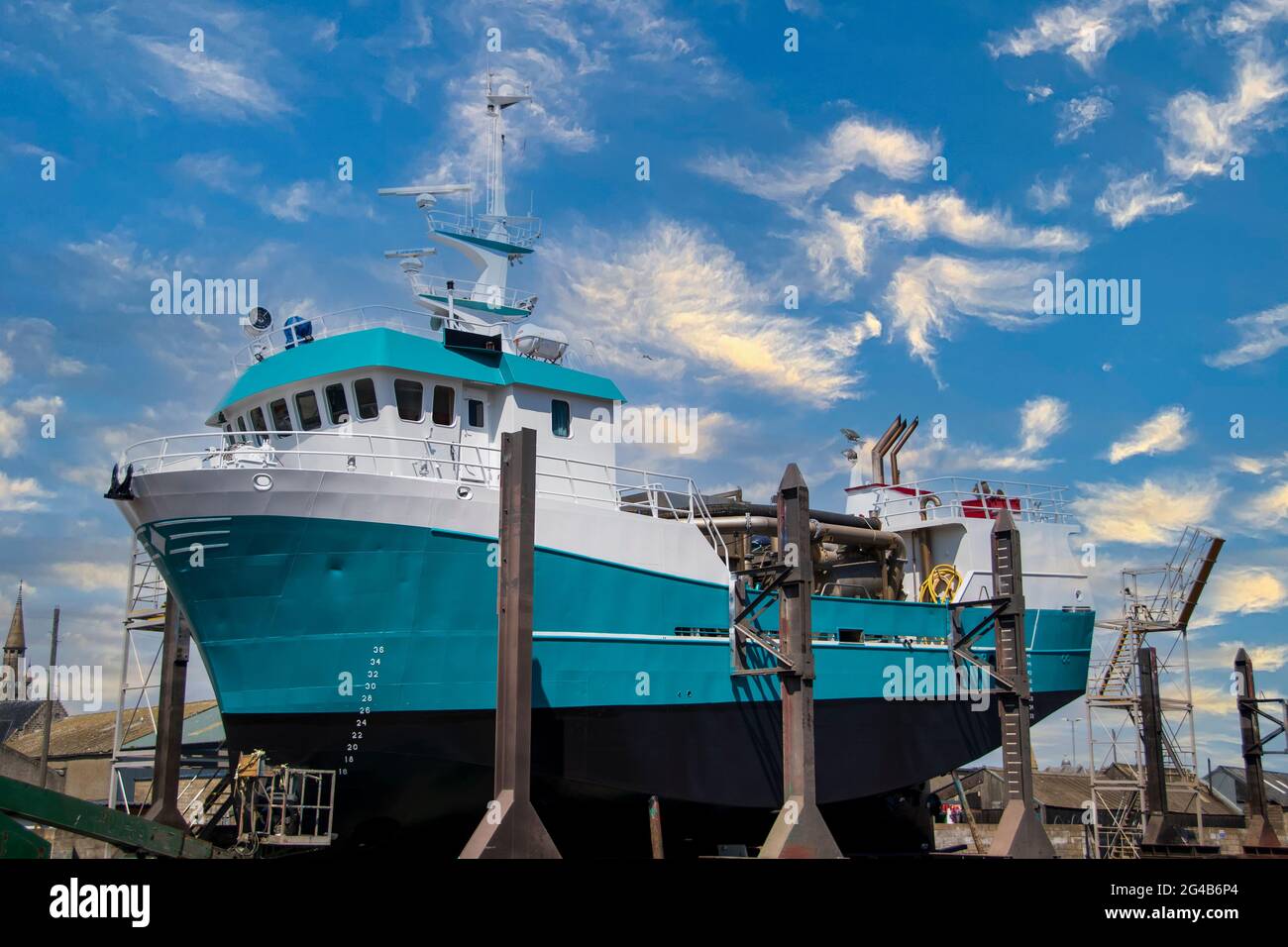 Side and a bow of a Trawler fishing Boat in Freaserbough repair yard, Aberdeenshire, Scotland, UK Stock Photo