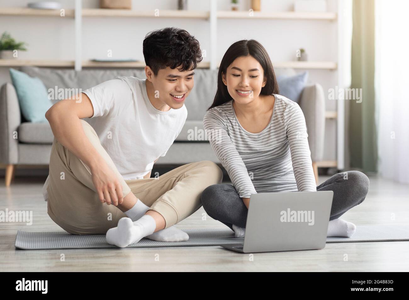 Sporty young man laptop hi-res stock photography and images - Alamy