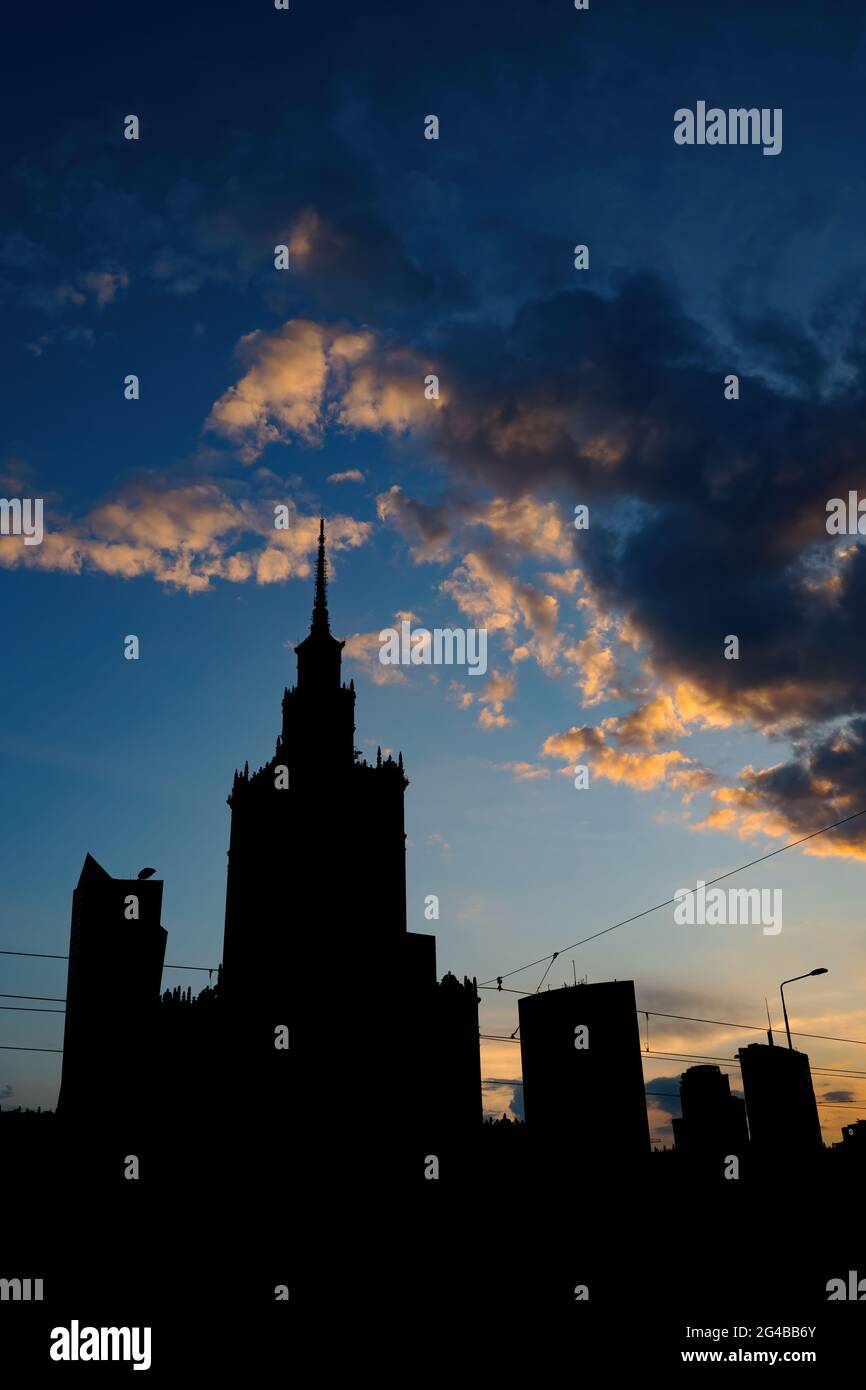 Silhouette of Warsaw city in Poland, downtown skyline against sunset ...