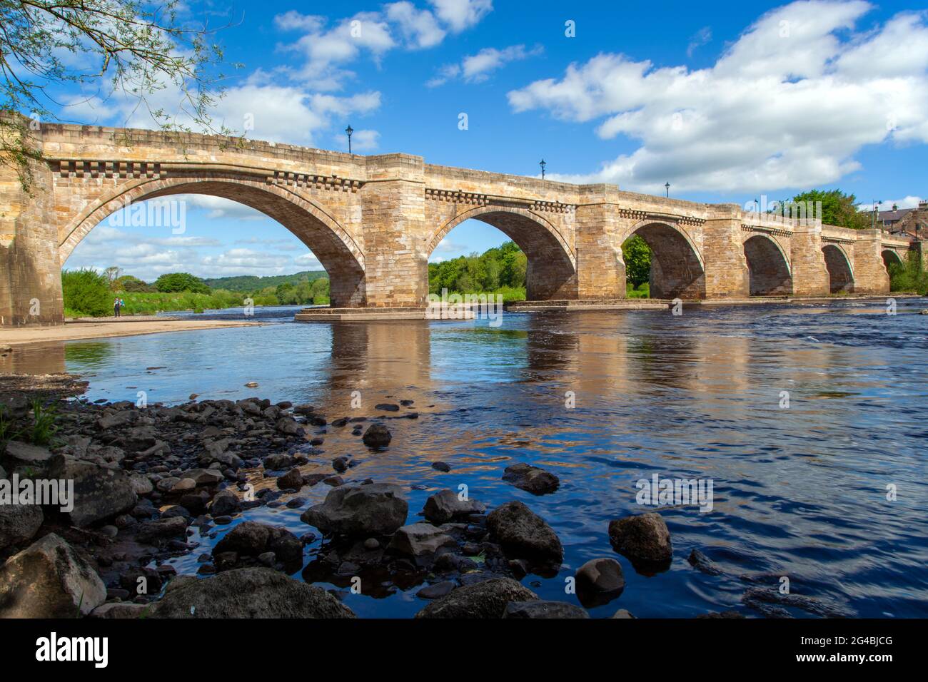 The multi arched bridge over the river Tyne at the Northumberland ...