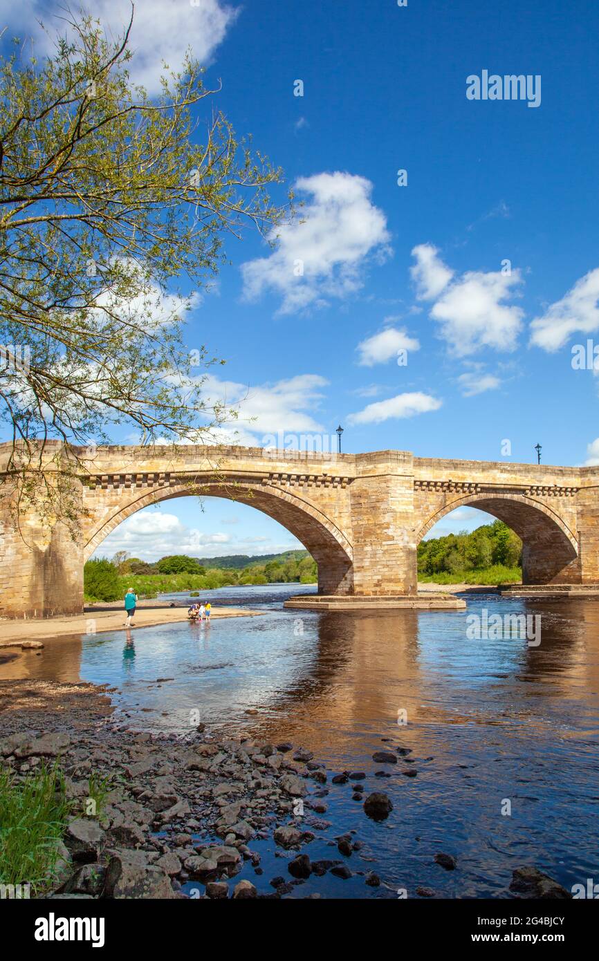 The multi arched bridge over the river Tyne at the Northumberland ...