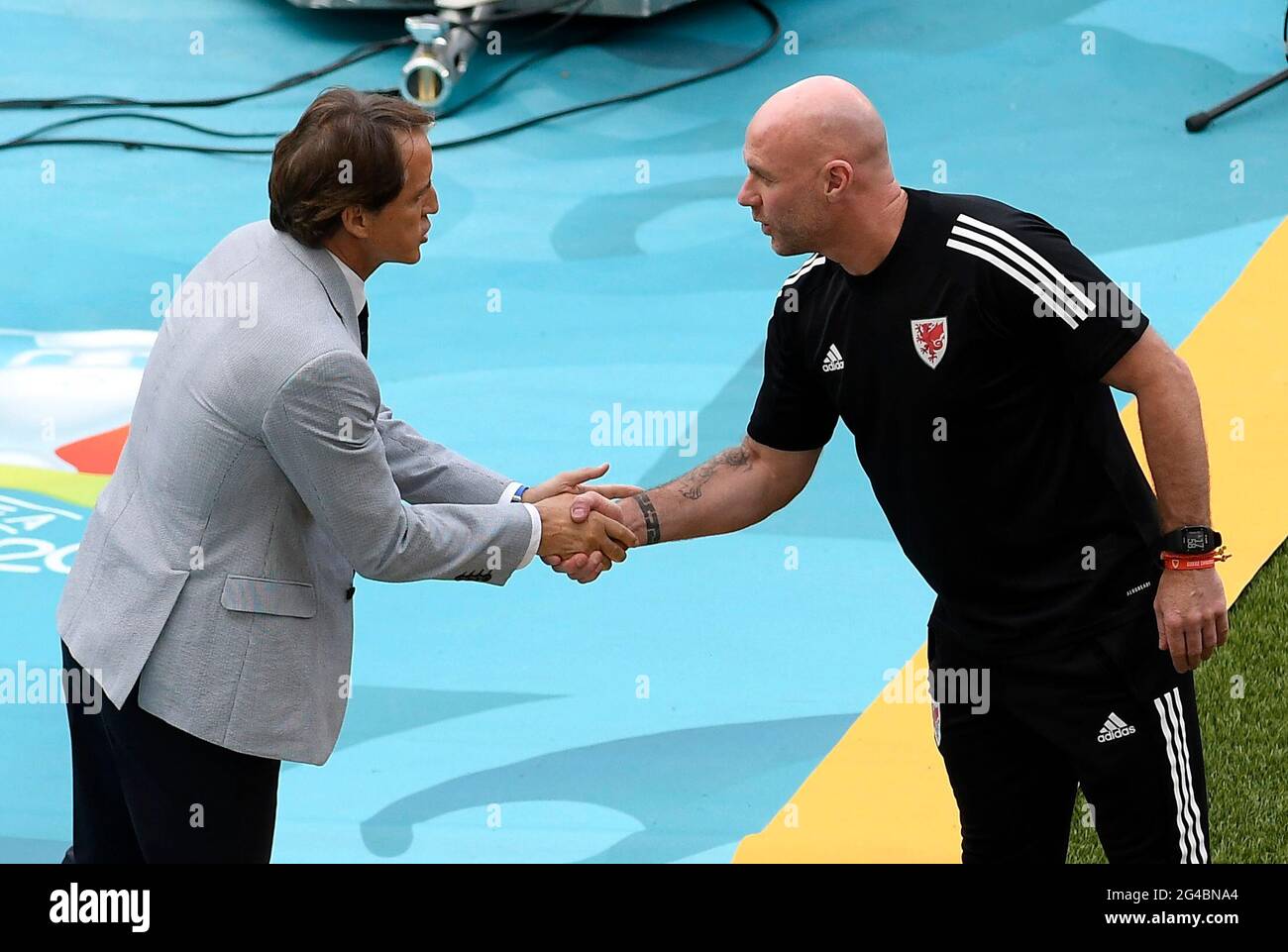 Italy manager Roberto Mancini greets Wales caretaker manager Rob Page before during the UEFA Euro 2020 Group A match at the Stadio Olimpico, Rome. Picture date: Sunday June 20, 2021. Stock Photo