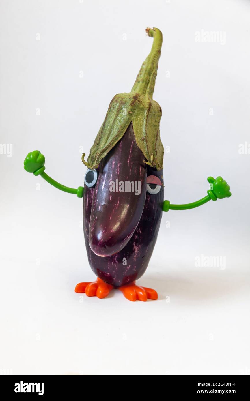 Funny humanized eggplant on white background Stock Photo - Alamy