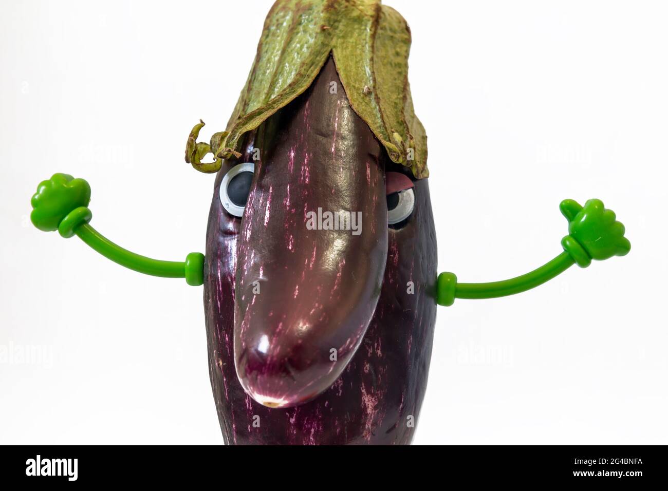 Eggplant closeup with human face Stock Photo Alamy